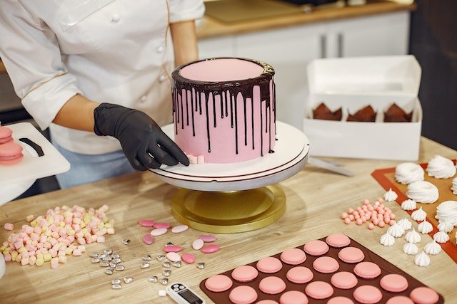 person baking a cake